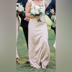 Gorgeous champagne bridesmaid dress with fitted top and crossed back